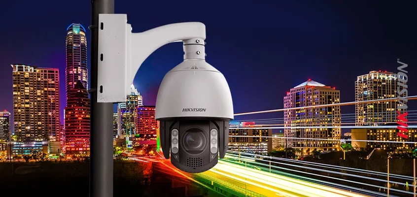PTZ camera watching a city road at night